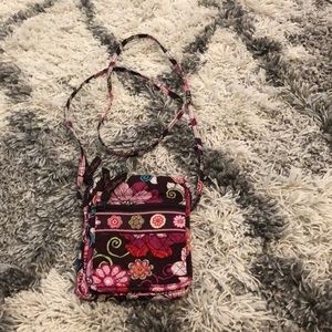 Vera Bradley cross body bag, has a lot of pockets.